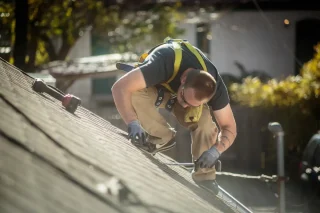 Roof installation contractor on rooftop